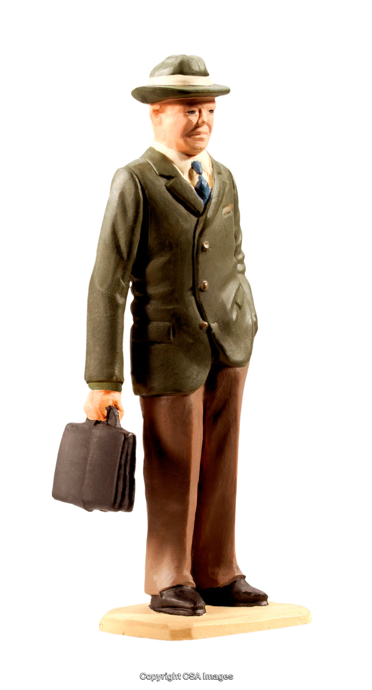 Vintage Male Figurine Holding Briefcase in Traditional Outfit