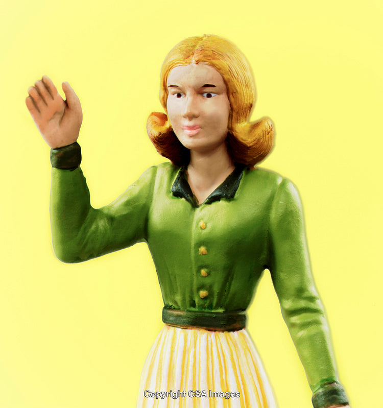 Sculpted Female Figurine Holding a Friendly Wave Against Yellow Background