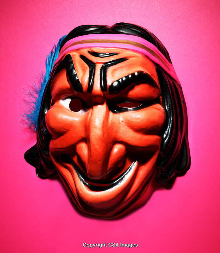 Vintage Plastic Mask Against Vibrant Pink Background