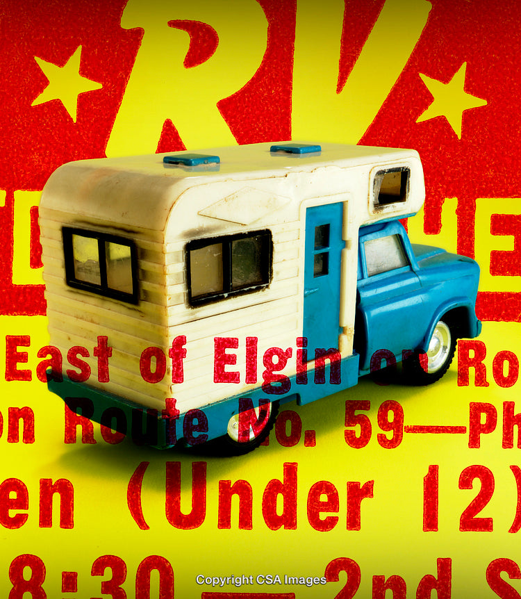 Retro Toy Camper with Bold Yellow and Red Vintage Typography Design