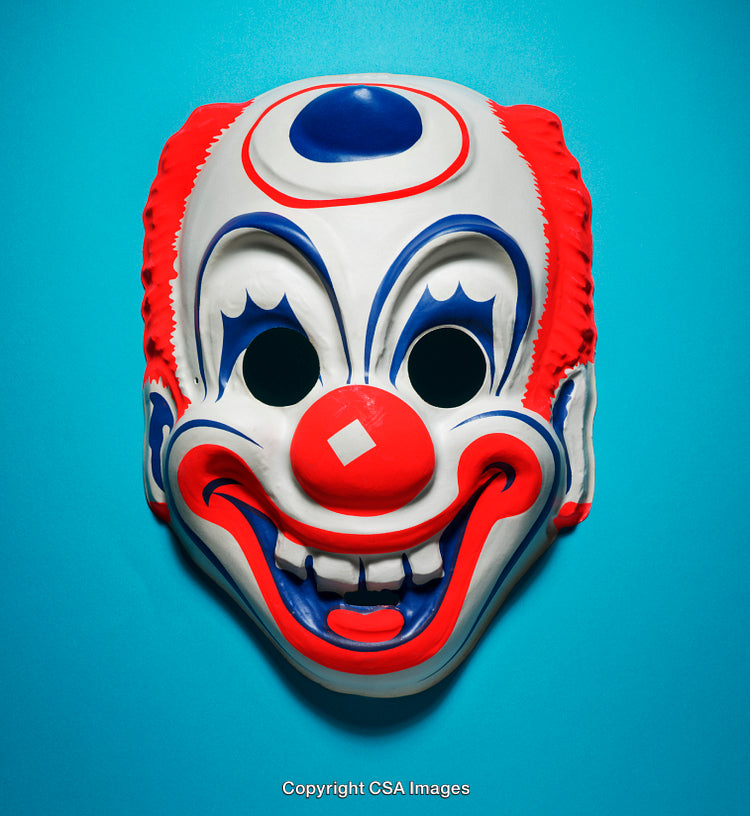 Colorful Clown Mask Against a Bright Blue Background
