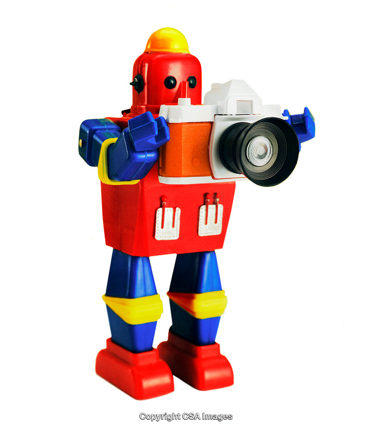 Vintage Toy Robot Holding a Camera in a Detailed Close-Up