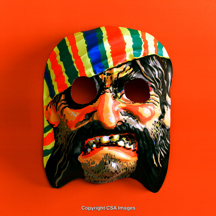 Colorful Decorative Mask Against Vibrant Orange Background