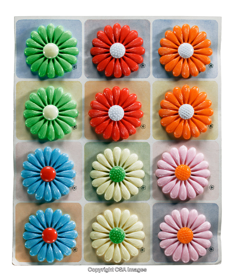 Colorful Plastic Flower Decorations in an Organized Grid Arrangement