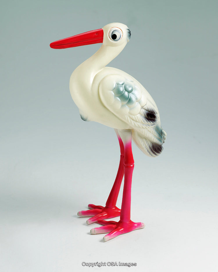 White Plastic Bird Toy with Vibrant Red Beak on Display