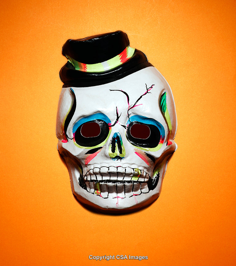 Vibrant Sugar Skull Mask with Hat on Orange Background