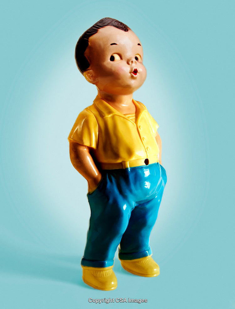 Ceramic Figurine of a Whistling Child in Bright Clothing