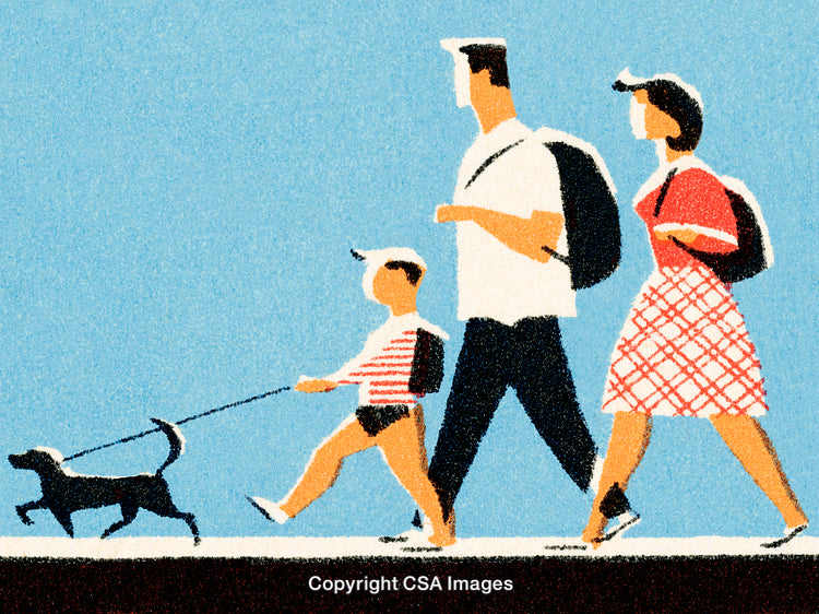 Family Enjoying a Walk Together Under a Clear Blue Sky