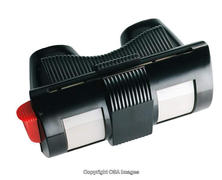 Close-Up of a Black Plastic Toy With Red Accents on Handle