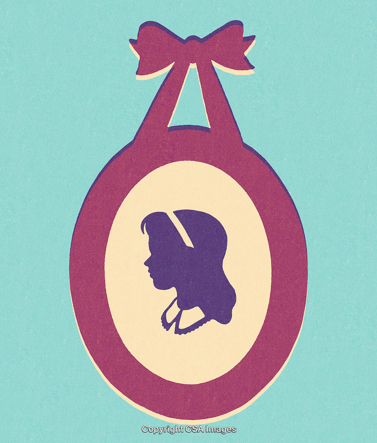 Vintage Silhouette of a Woman in a Bow-Accented Oval Frame