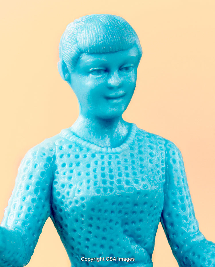 Colorful Plastic Figure Against a Minimal Vibrant Background