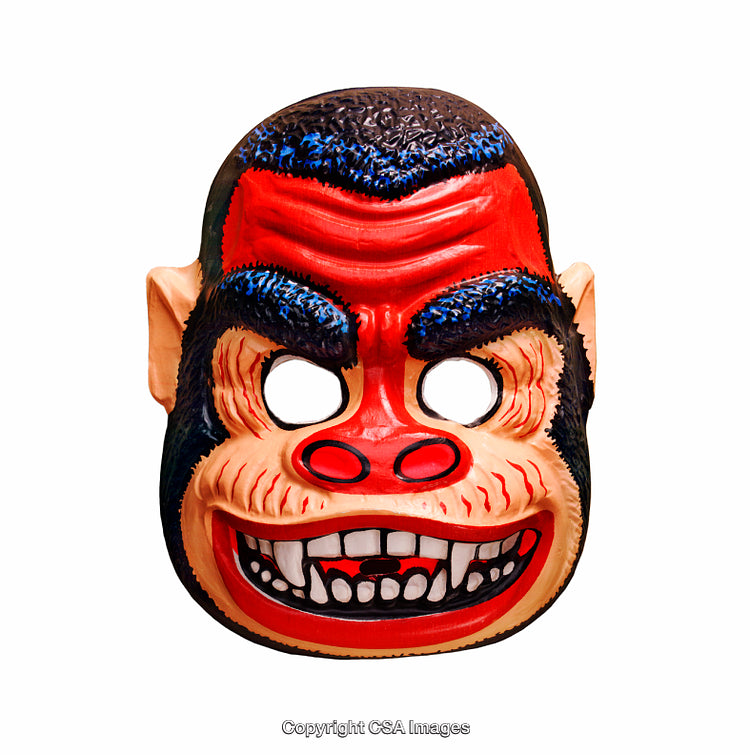 Vintage Plastic Halloween Mask Featuring Bright Colors and Bold Facial Expression