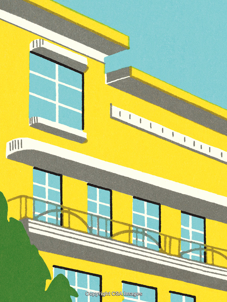 Modern Yellow Building With Geometric Design and Bright Daytime Sky