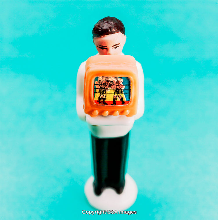 Plastic Toy Figure Holding a Retro Television Playing a Wrestling Match