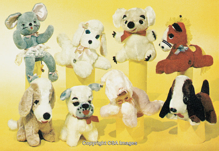 Colorful Vintage Stuffed Animals Displayed on a Bright Yellow Background