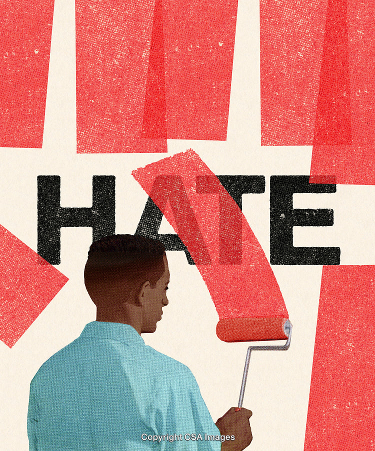 Man Painting Over Hate Graffiti with Positive Artistic Expression