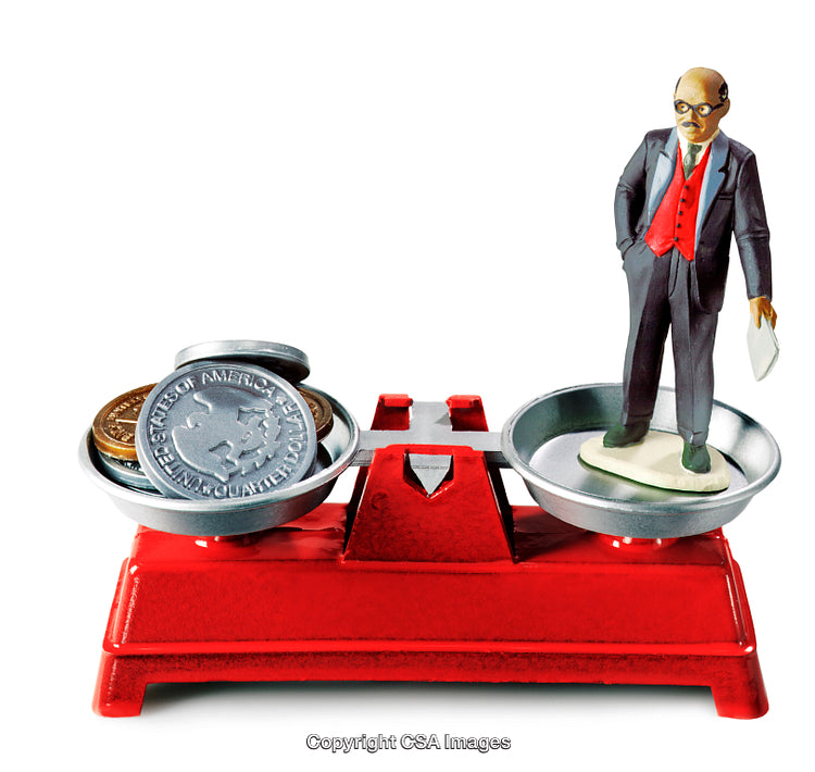 Symbolic Scale Balancing Coins and a Figurine Depicting Economics