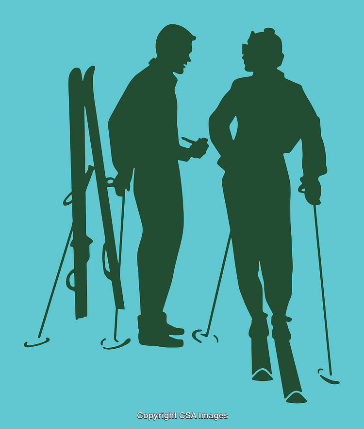 Silhouetted Skiers Conversing Against a Blue Background in Winter Activity Setting