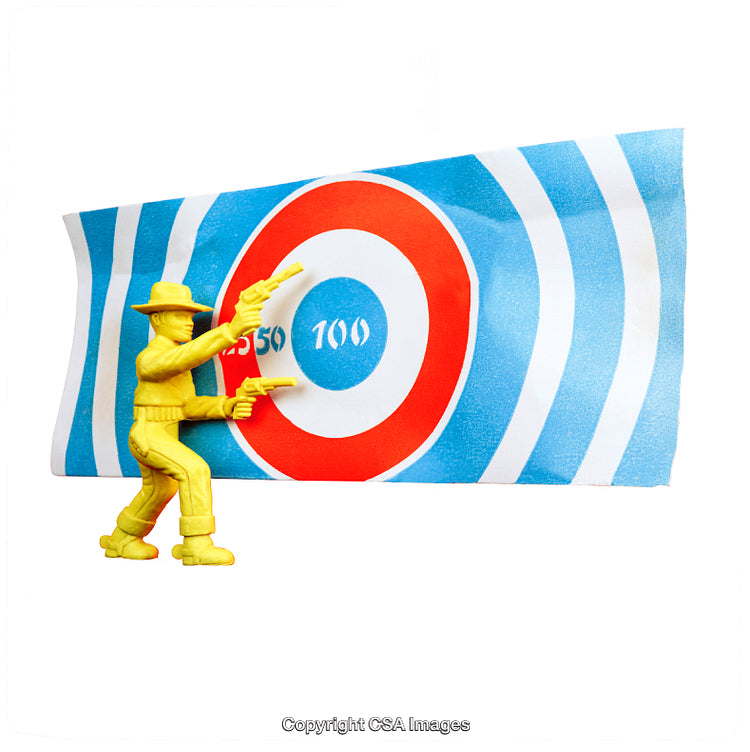 Yellow Cowboy Toy Figure Shooting at a Brightly Colored Target