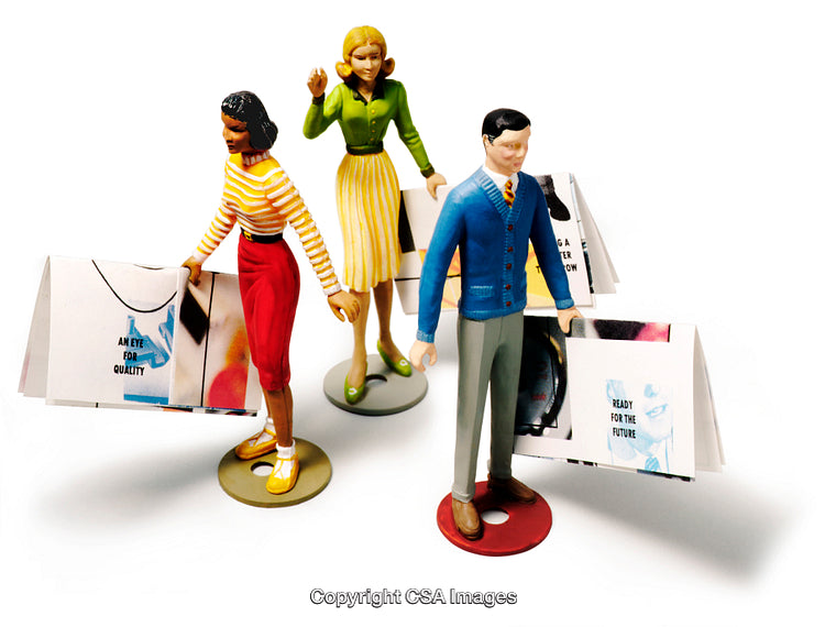 Miniature Figurines Displaying Posters Reflecting Modern Values and Business Themes