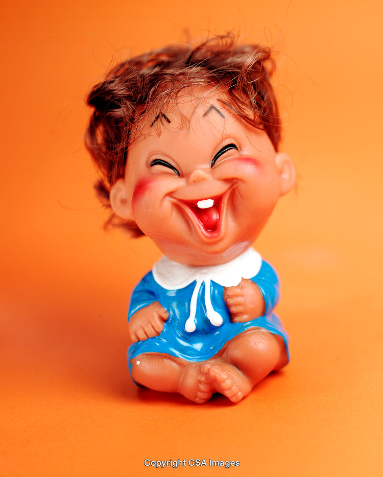 Happy Children Toy Figure With Cheerful Expression and Blue Outfit