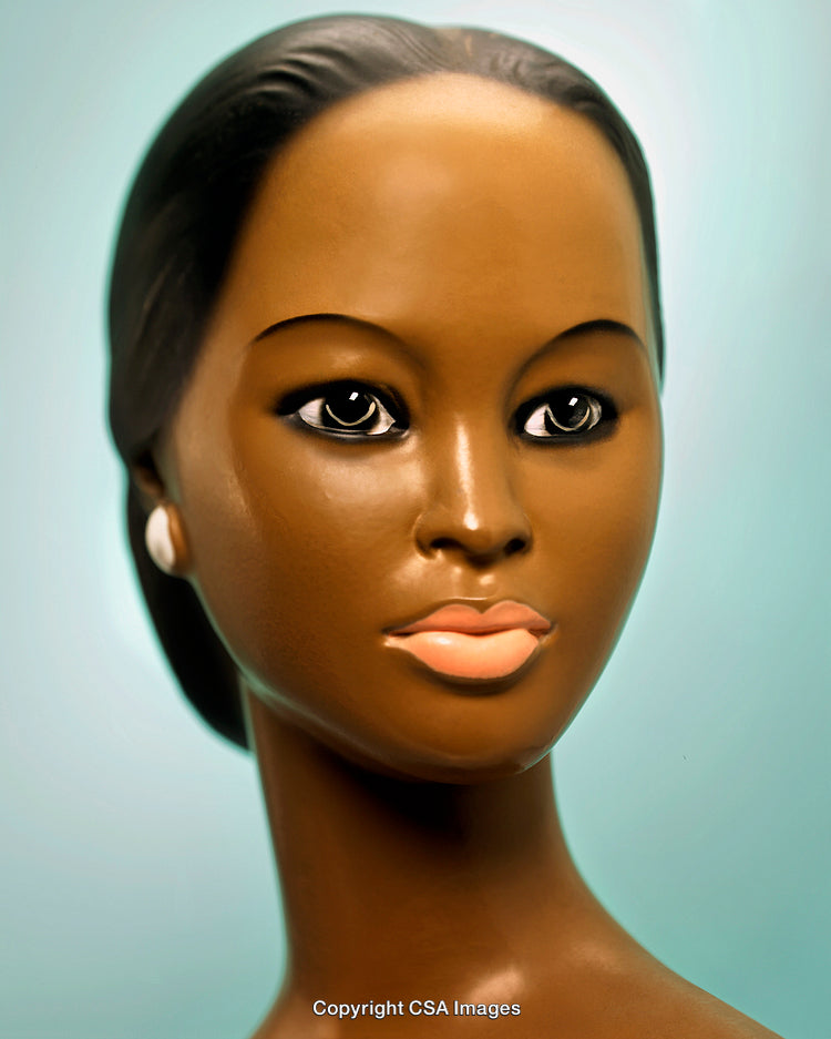 Elegant Female Mannequin Face Against a Soft Blue Background