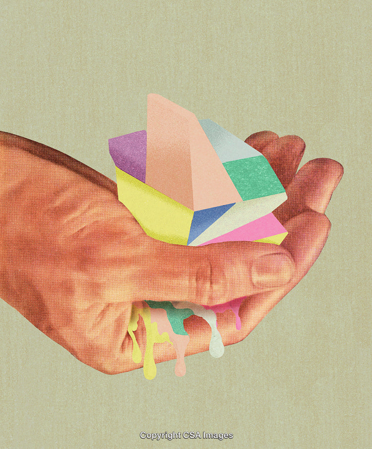 A Hand Holding Abstract Shapes with Multicolored Dripping Elements