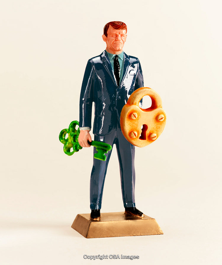 Businessman Figurine Holding Key and Lock Symbolizing Security and Opportunity