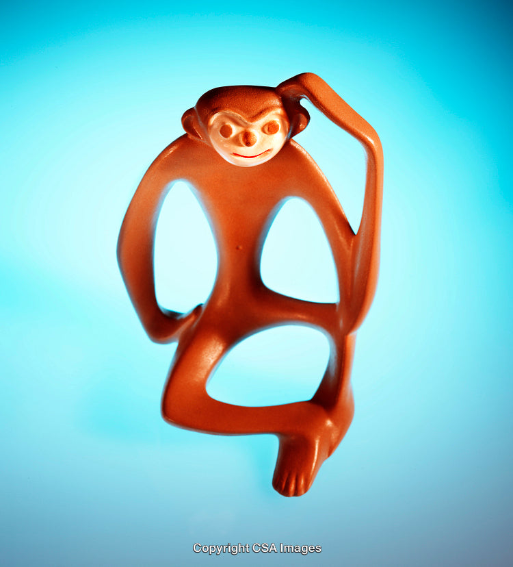 Modern Cartoon Monkey Figurine With Bright Blue Background
