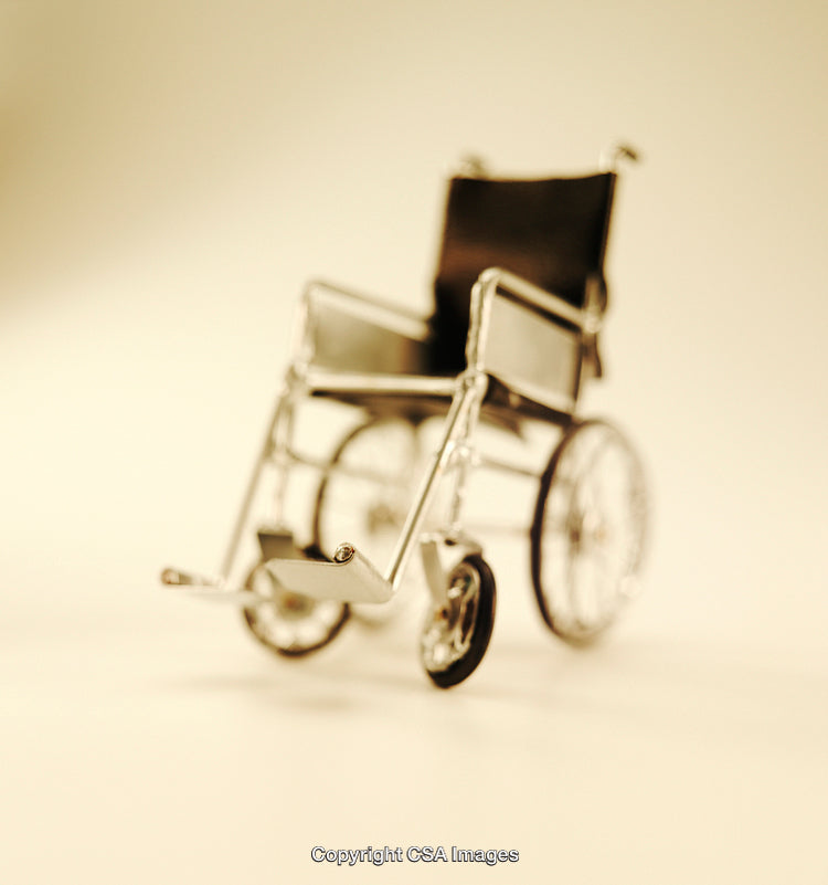 Miniature Wheelchair Toy Model in Artistic Composition