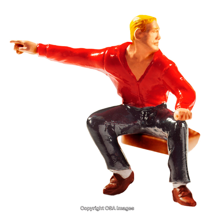 Figurine of a Seated Man Pointing in Casual Red Shirt
