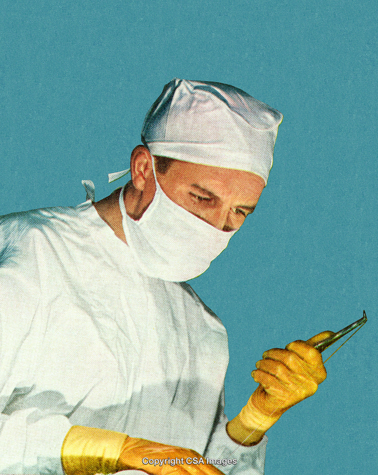 Medical Surgeon in Sterile Attire Holding Surgical Instrument, Preparing for Procedure
