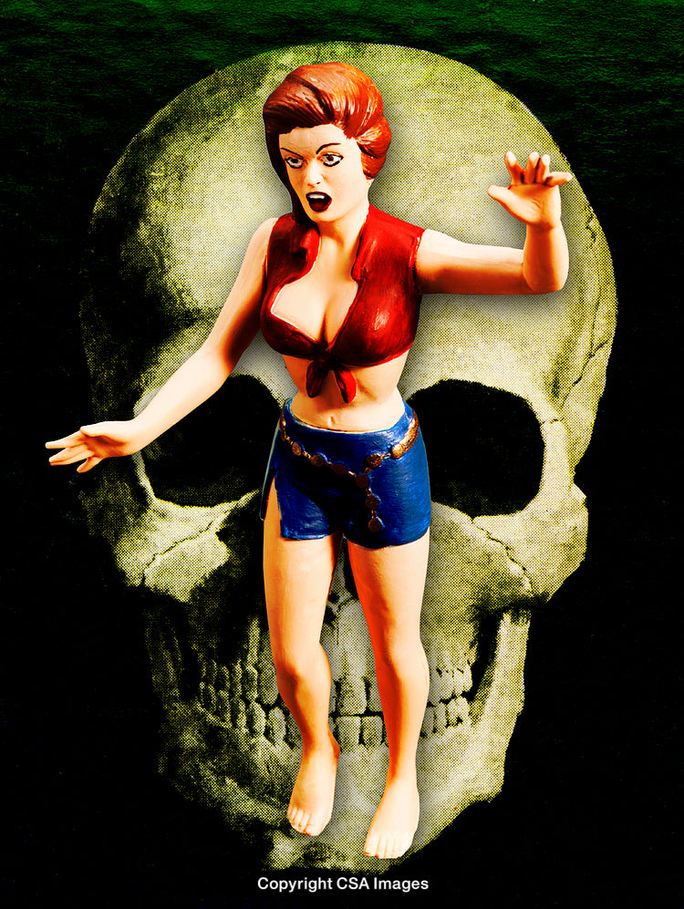 Retro Female Figurine with Dramatic Pose Against Spooky Skull Background