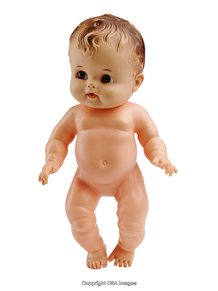 Vintage Style Plastic Baby Doll Against a White Background