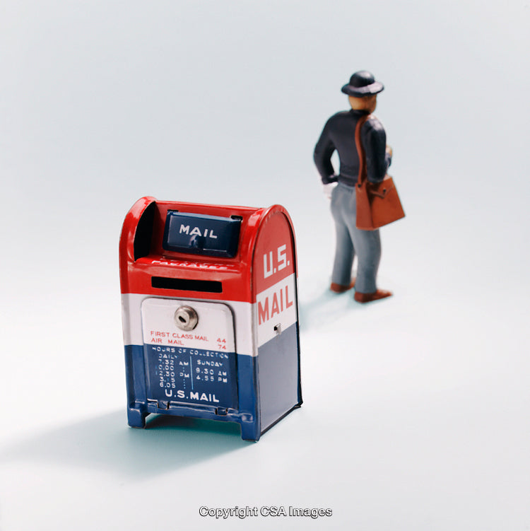 Toy Mailbox and Postman Miniature Scene on White Background