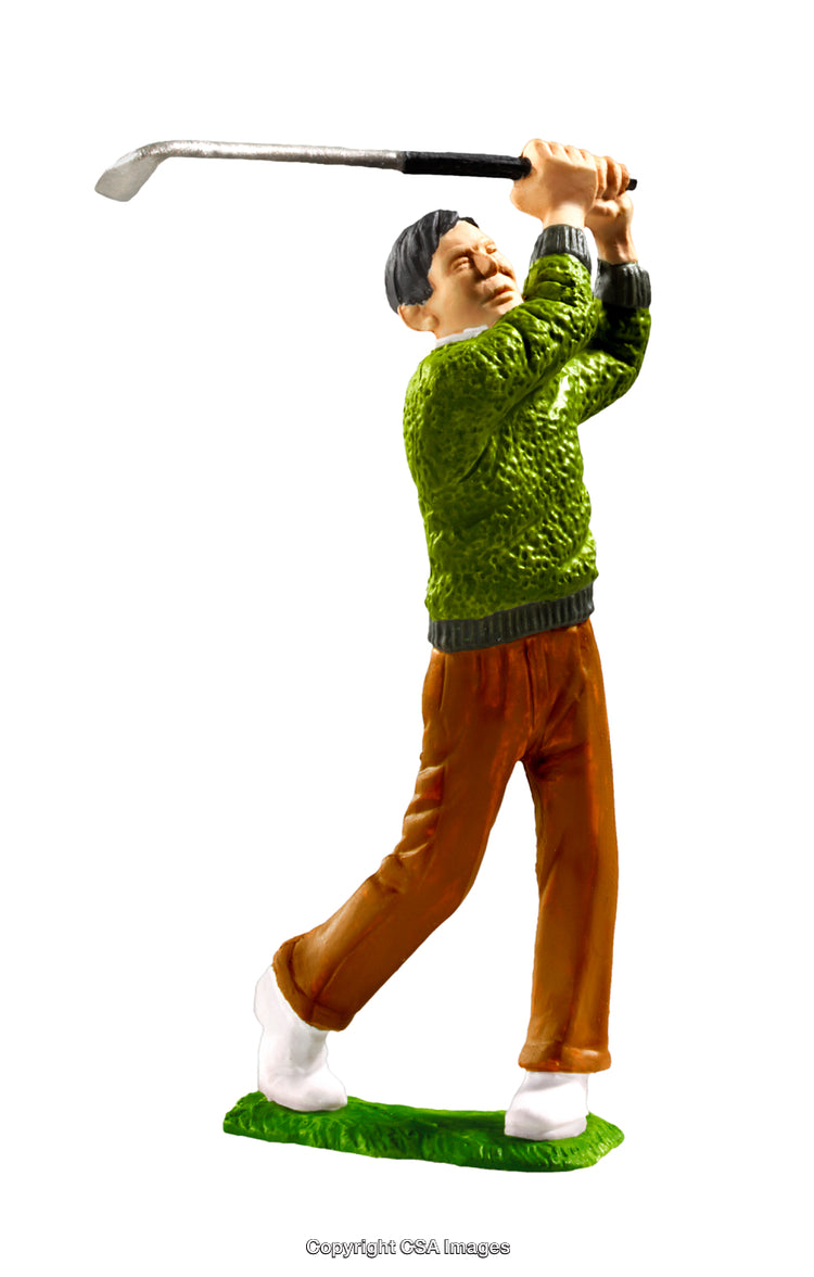 Plastic Figurine of a Golfer Swinging on a White Background