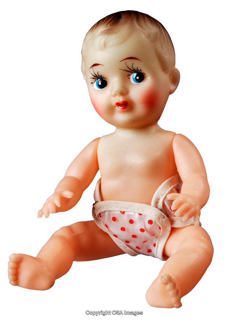 Vintage Plastic Doll in Polka Dot Diaper with Blue Eyes on White Background