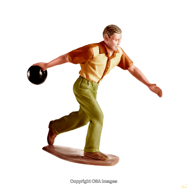 Plastic Figurine of a Man Bowling with a Ball in Action Pose