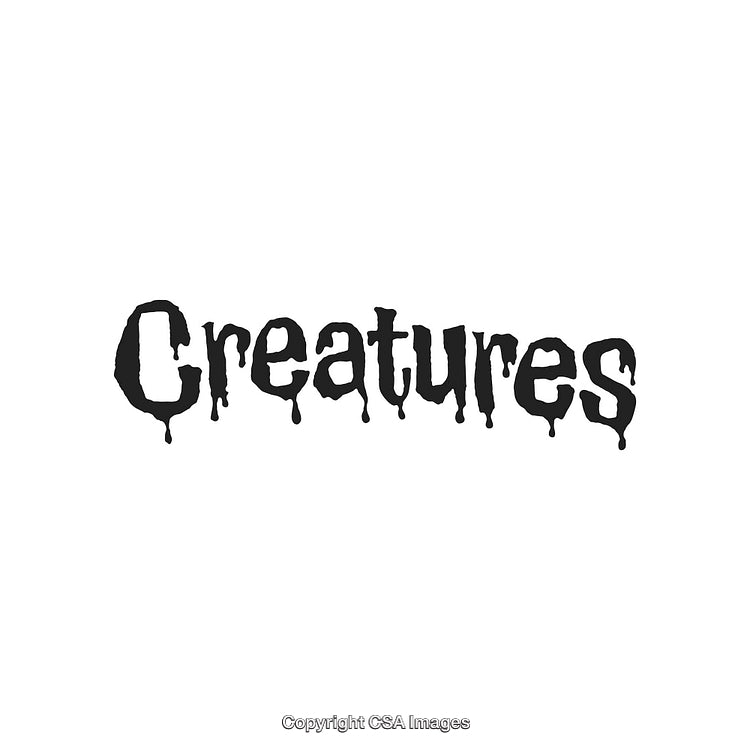 Eerie Dripping Font Text Spelling 'Creatures' with Mysterious Atmosphere