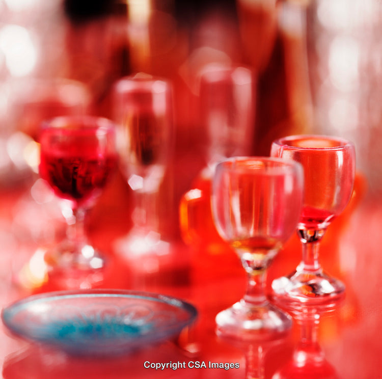 Colorful Glassware with Abstract Bokeh Effect in Vibrant Lighting