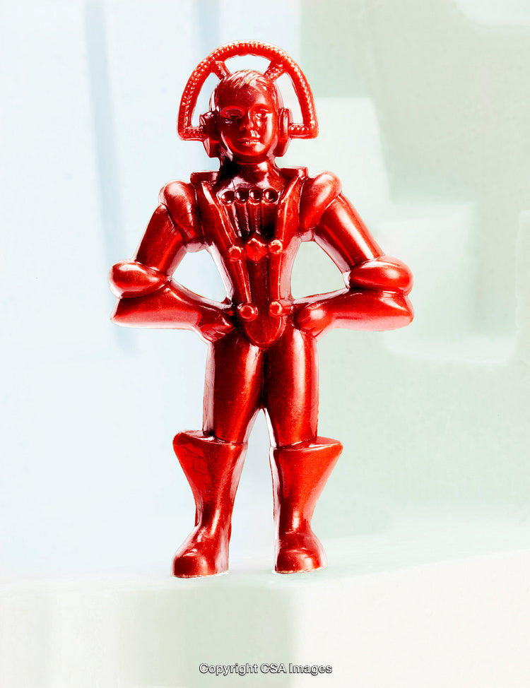 Red Plastic Futuristic Action Toy Figurine with Abstract Background
