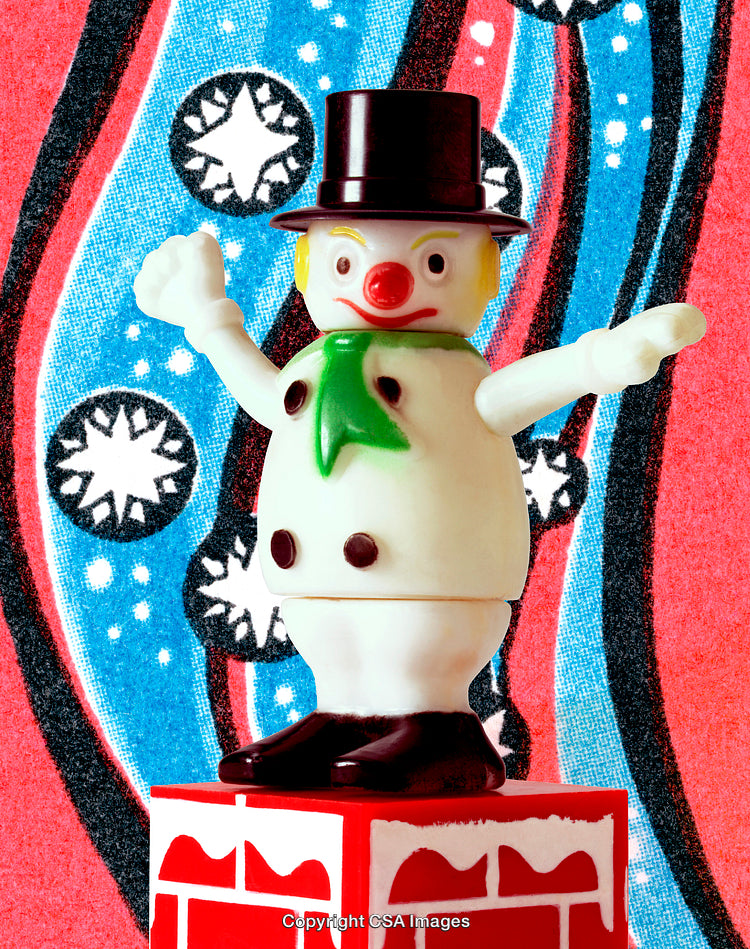 Festive Plastic Toy Snowman on Decorative and Colorful Background