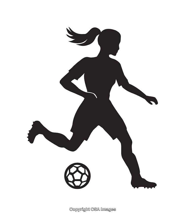 Silhouette of a Female Soccer Player in Action with Ball