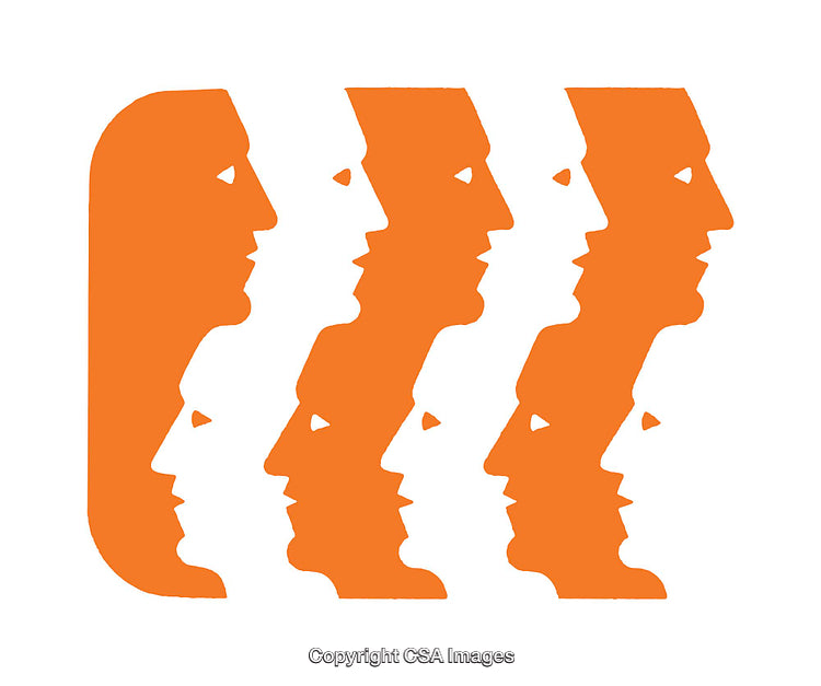 Abstract Pattern of Orange Faces in a Repeated Design