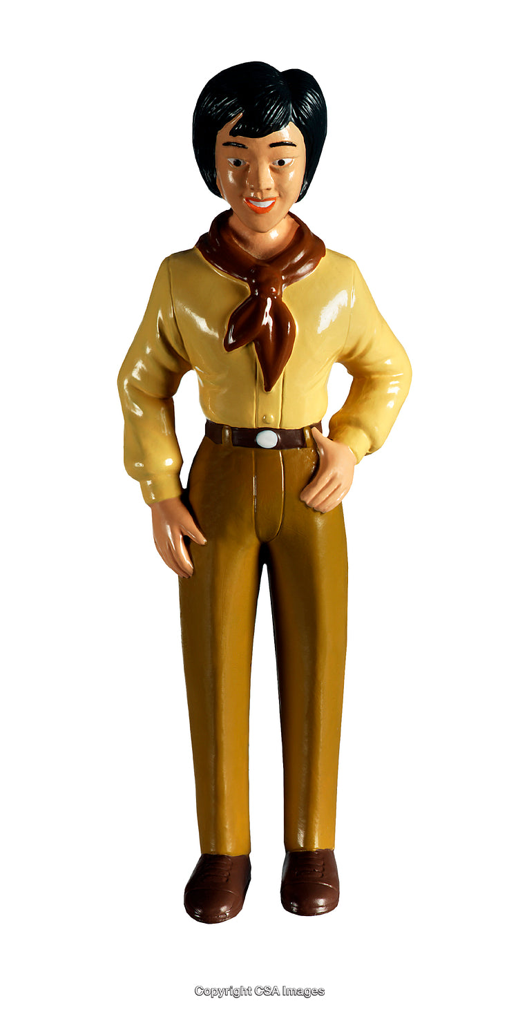 Plastic Figurine of a Person in Brown Attire With Bright Expression
