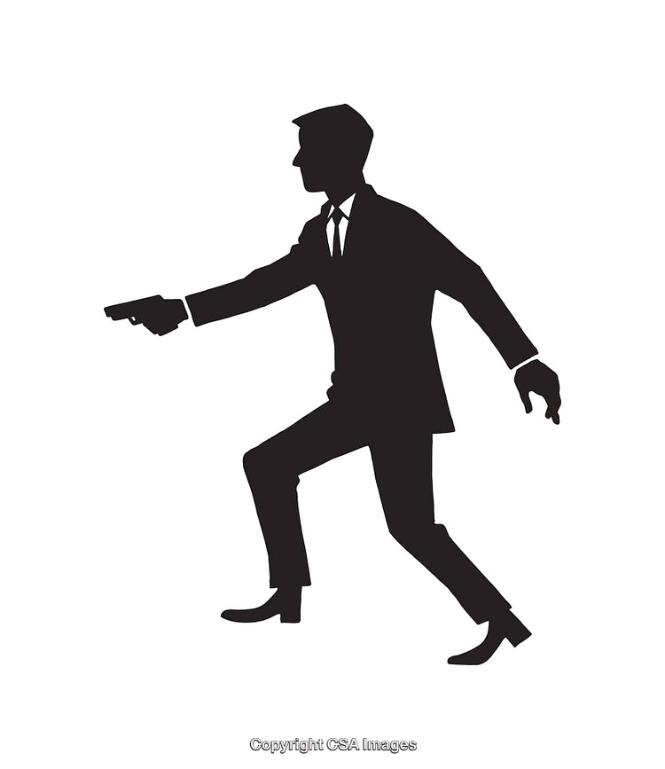 Silhouette of a Man in Action Holding a Handgun