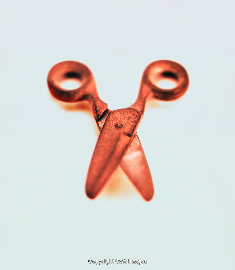 Close-Up of Red Scissors on a Neutral Background