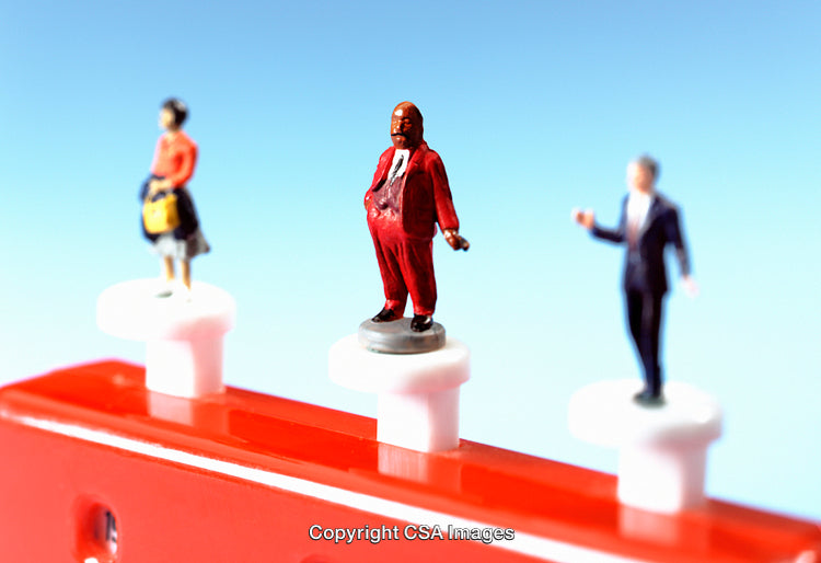 Colorful Miniature Figures Displayed on a Bright Plastic Surface