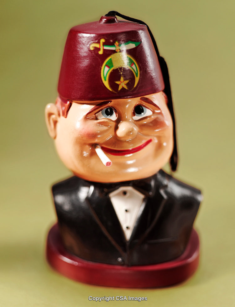 Vintage Cartoon Figure Wearing Red Fez Hat with Bow Tie