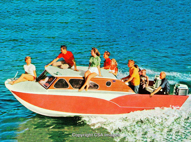 Group of People Enjoying a Vibrant Boating Adventure on Blue Waters